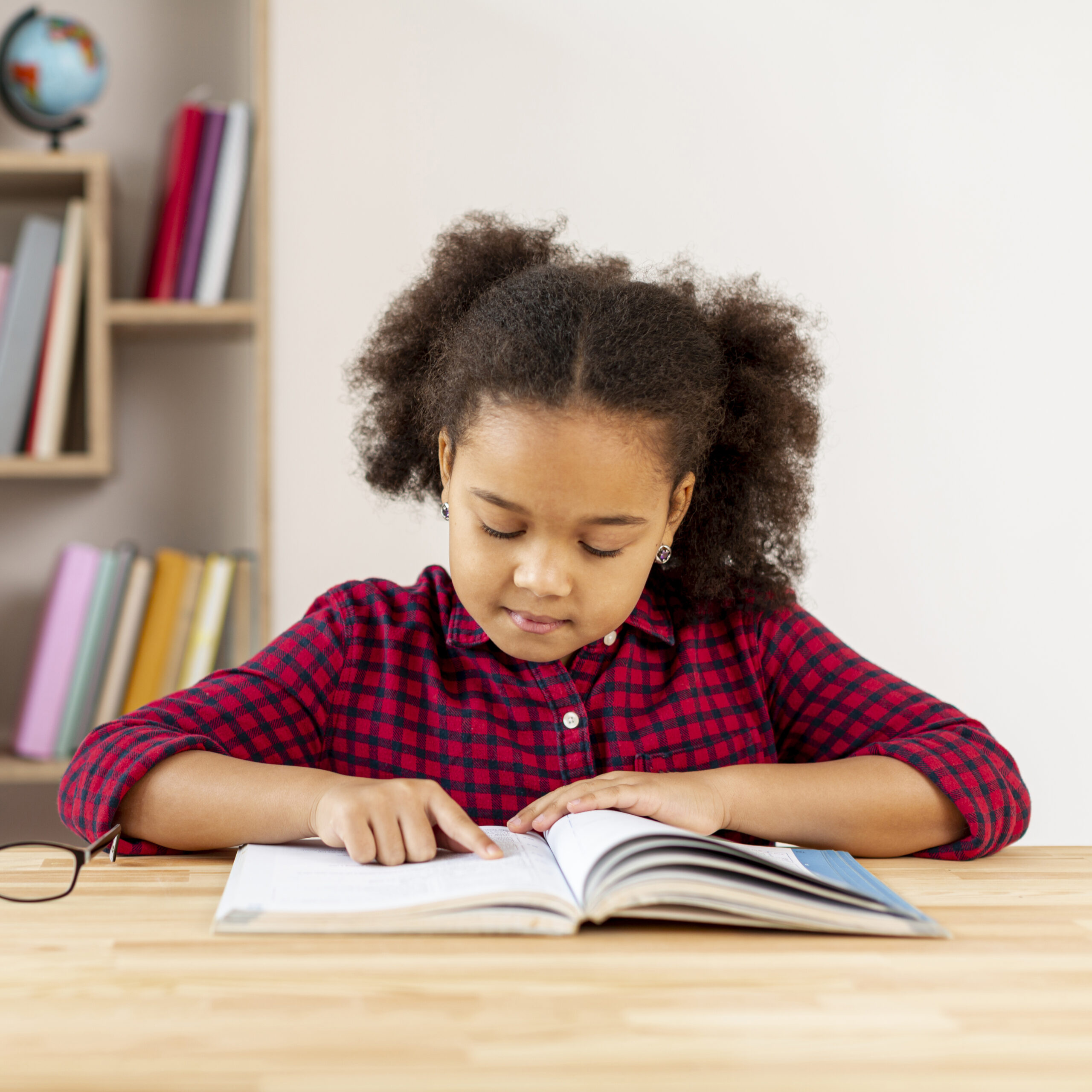 front view little girl reading scaled